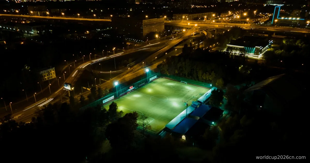 an aerial view of a tennis court at night
