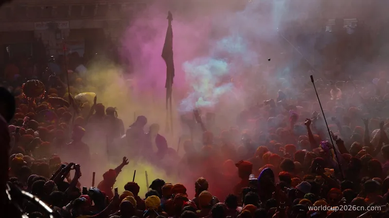 a large crowd of people with colored smoke