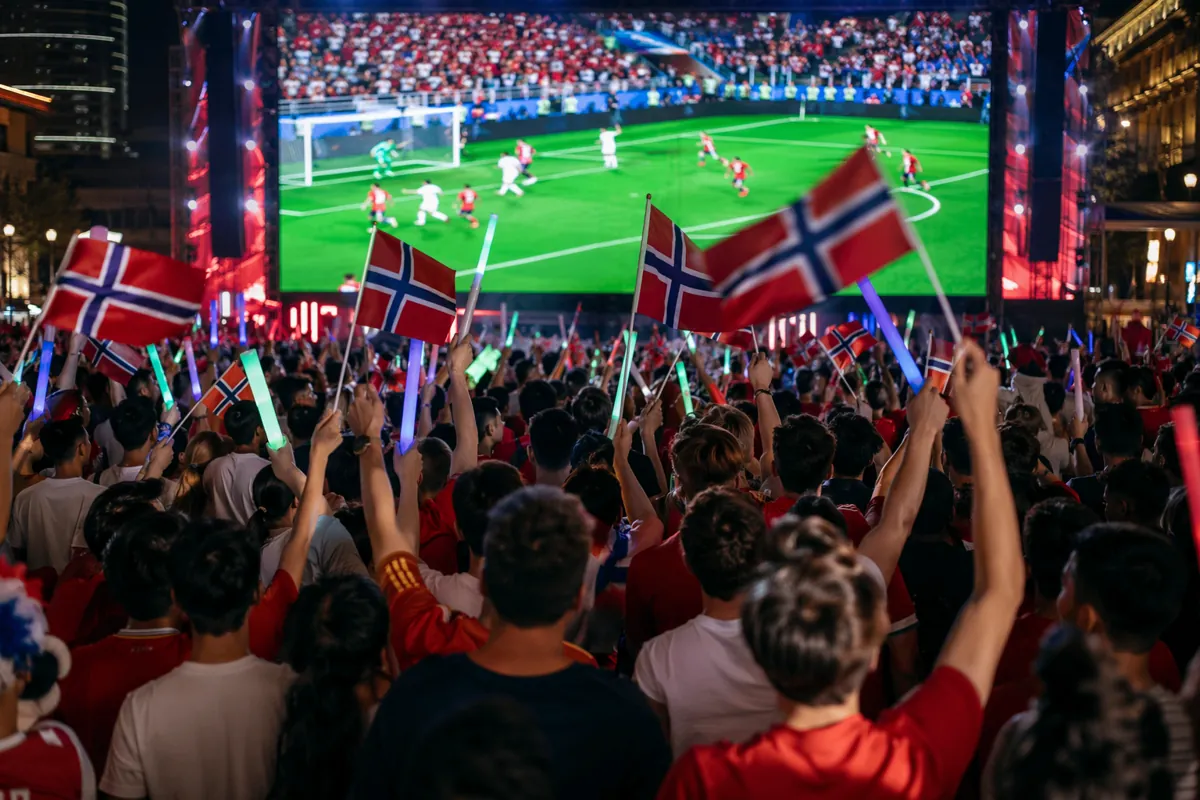 Wide shot of vibrant World Cup viewing party in China, football fans cheering with Norwegi